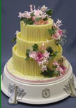 traditional ivy wedding cake on swan stand